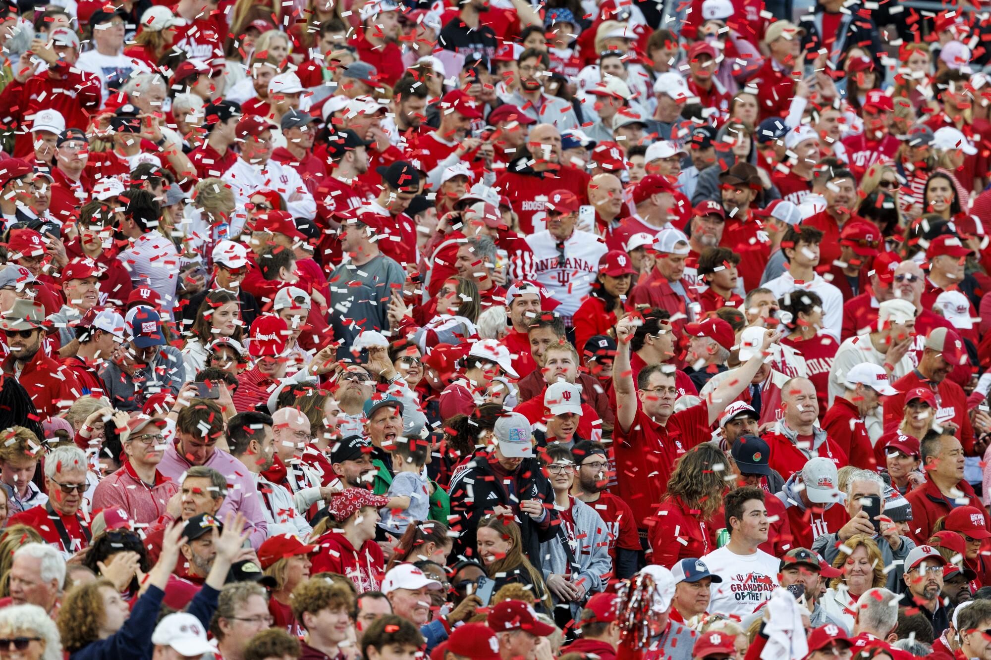 Indiana fans celebrate after the Hoosiers' 38-3 win over Alabama in the Rose Bowl on Thursday.