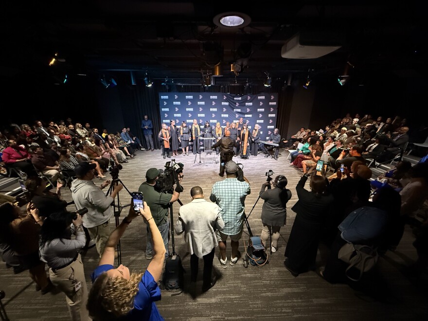 Tuesday's news conference at TPR included a performance from the SAACAM choir