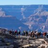 Tourists flock to Mather Point at Grand Canyon National Park, Oct. 1, 2025, in Grand Canyon, Ariz.