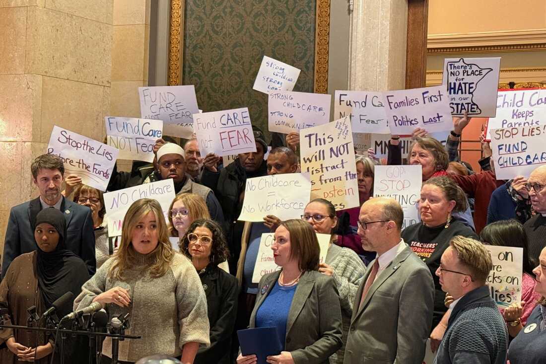 Child care advocates speak at a news conference last month in the Minnesota state capitol building in St. Paul.
