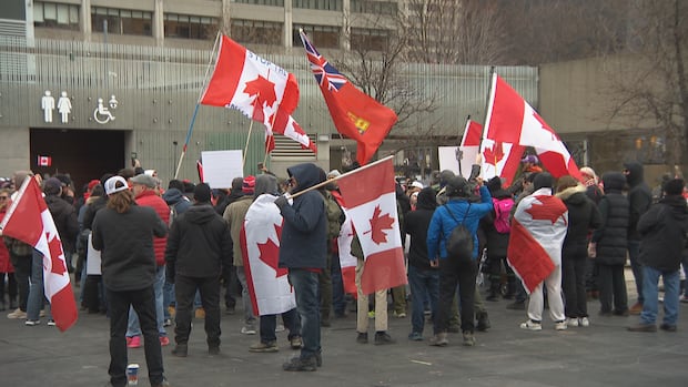 Dozens gather for anti-immigration rally, counter-protest in downtown Toronto