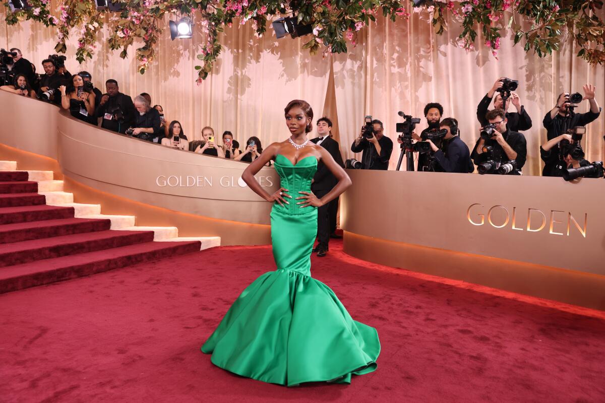 Olandria Carthen wears a strapless green gown on the red carpet at the 2026 Golden Globes