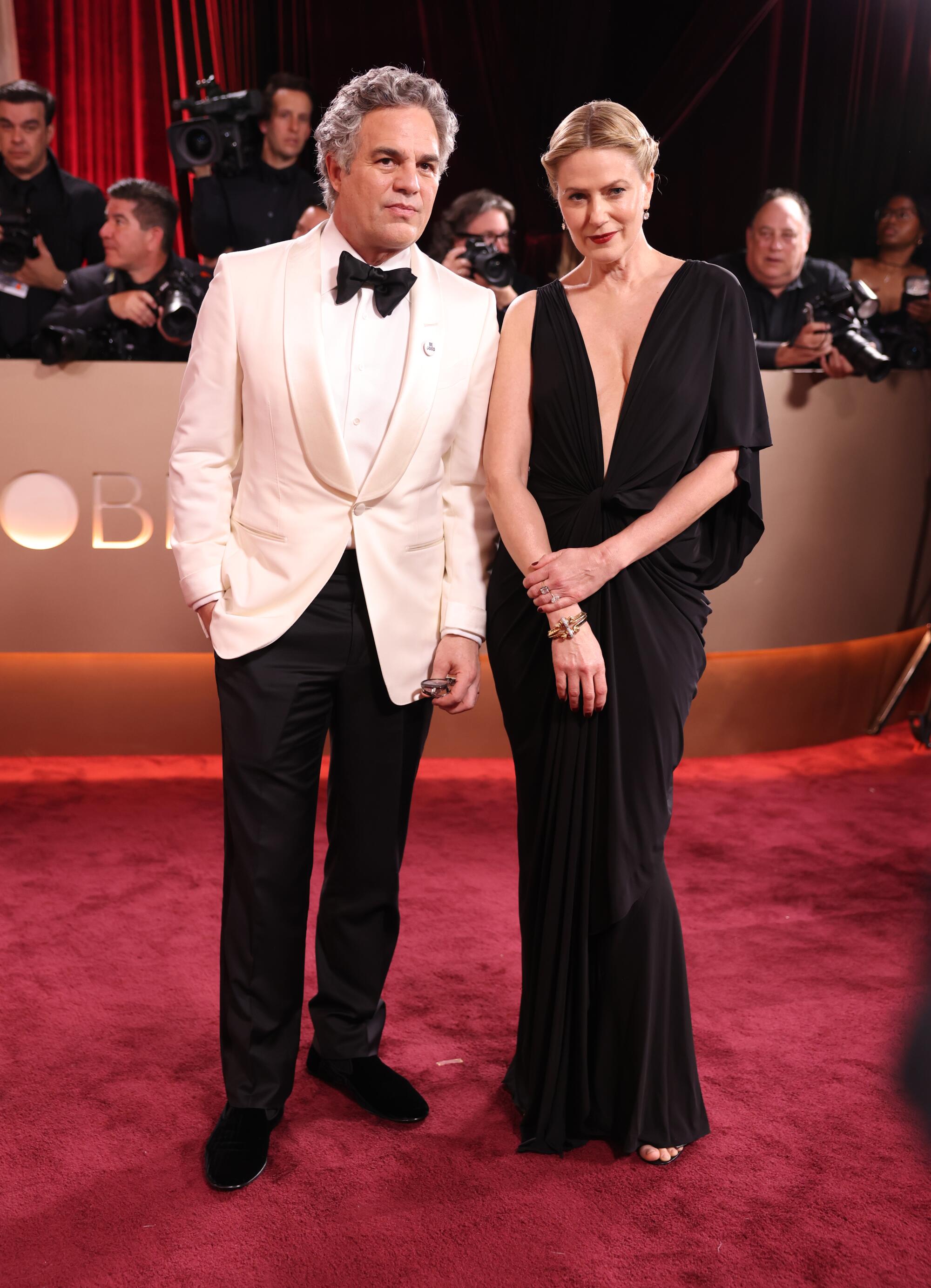 Mark Ruffalo and Sunrise Coigney pose on the red carpet.