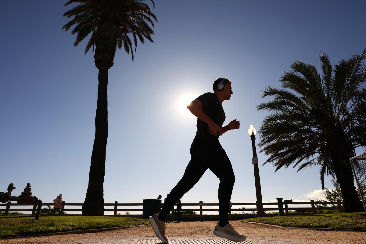 A runner passes along the path on Ocean Boulevard.