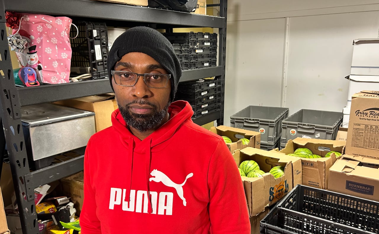 Man standing in a food bank.