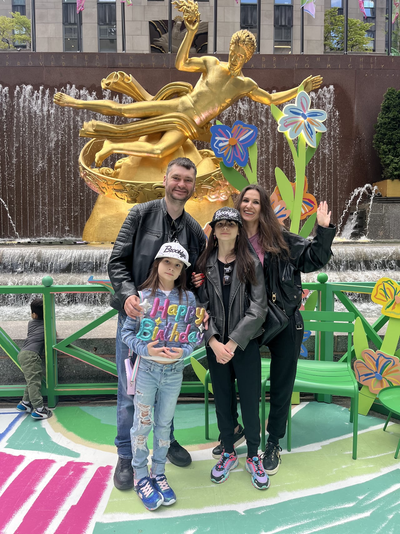 A family poses for a photo on vacation.