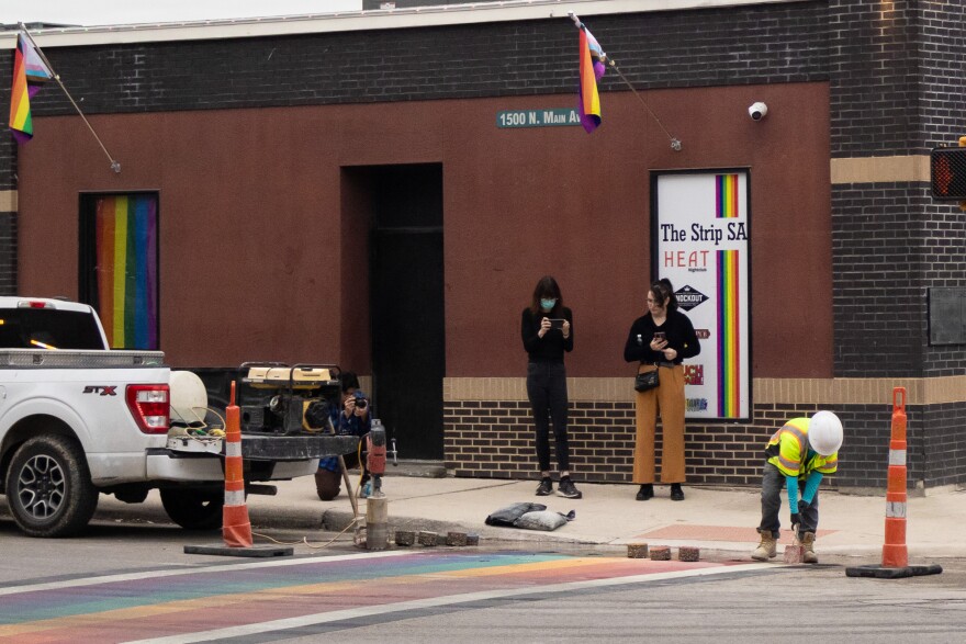 Activists Anna Levallee and Matilda Miller visit the removal of the rainbow sidewalk on the intersection of Main Avenue and Evergreen Street on January 12, 2025