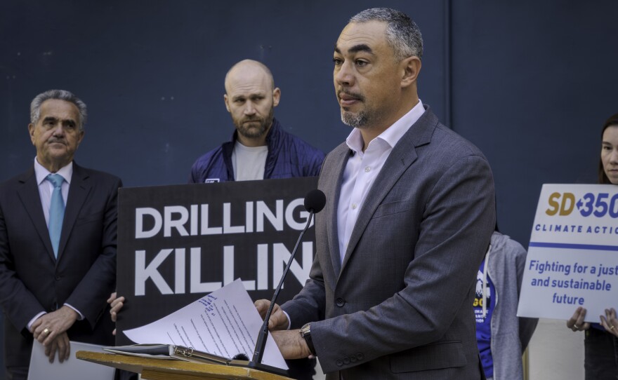 San Diego City Council member Sean Elo-Rivera, front, at a press conference in downtown on January 13, 2025, against new offshore drilling. City Council President Joe LaCava, left, and Mitch Silverstein, of Surfrider Foundation, middle, participated. 