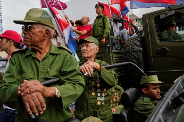 Veterans of the 1959 Cuban Revolution take part in a parade during the anniversary of Fidel Castro's arrival to the capital as the head of the rebel army, in Havana, Thursday, Jan. 8, 2026. (AP Photo/Ramon Espinosa)