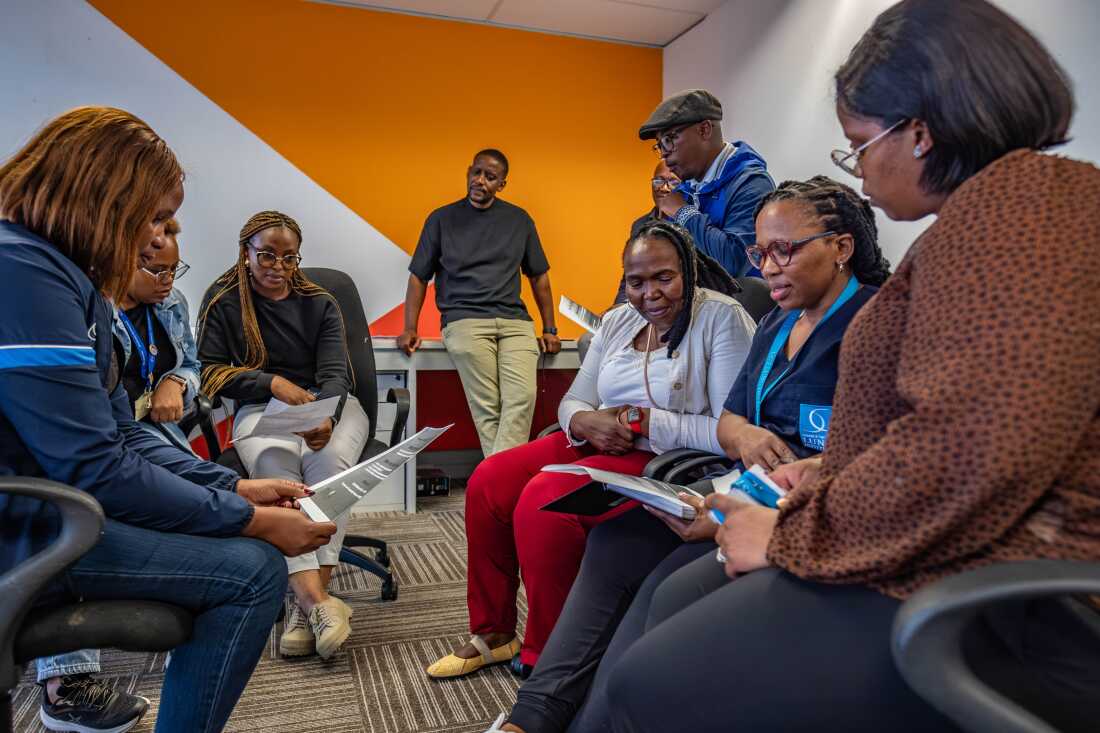 Health workers involved with the upcoming clinical trials of the BRILLIANT HIV vaccine meet at the offices of the Desmond Tutu Health Foundation in the Philippi neighbourhood of Cape Town, South Africa.