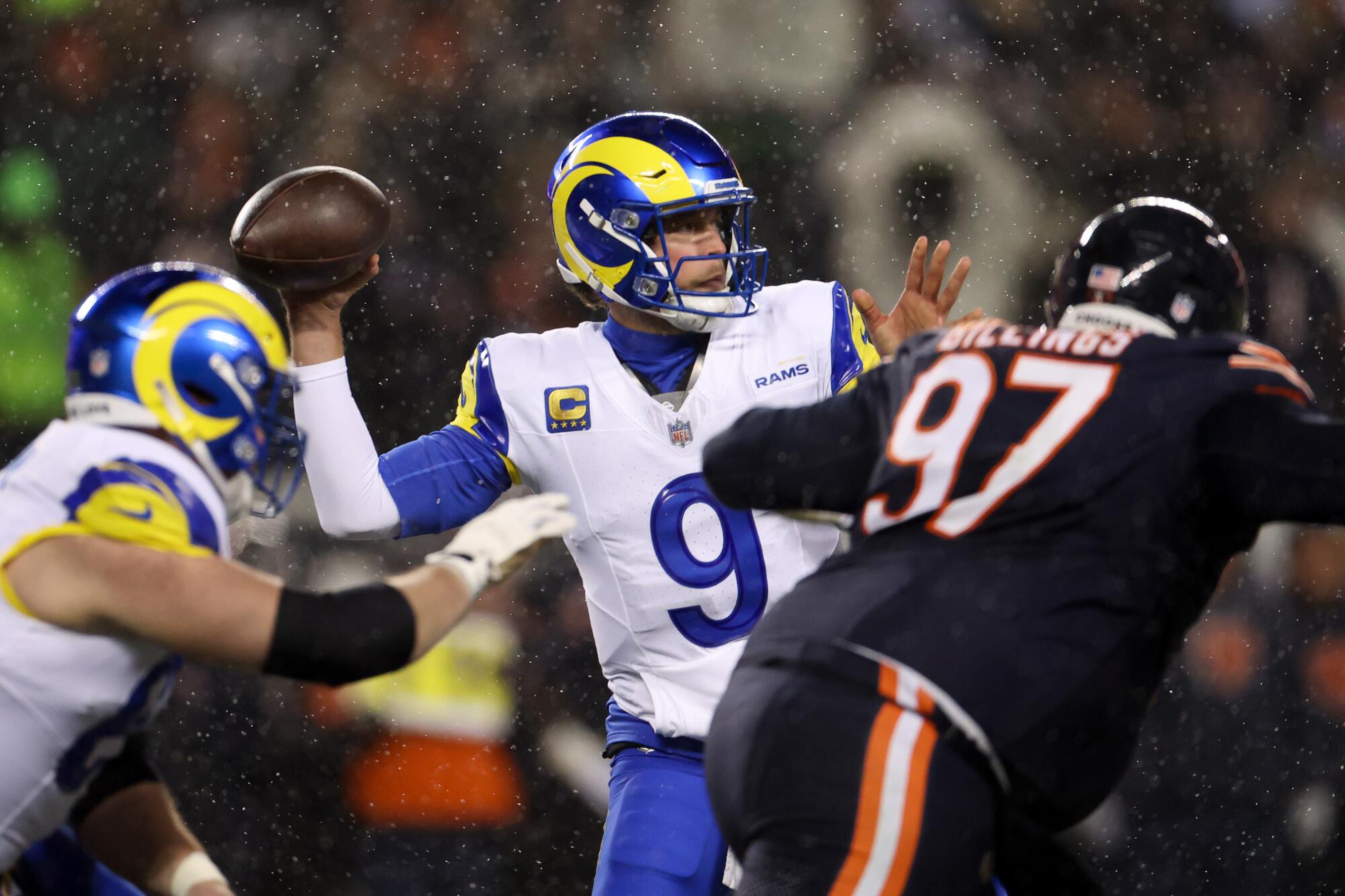 Rams quarterback Matthew Stafford passes in the first quarter of the Rams' 20-17 overtime win.