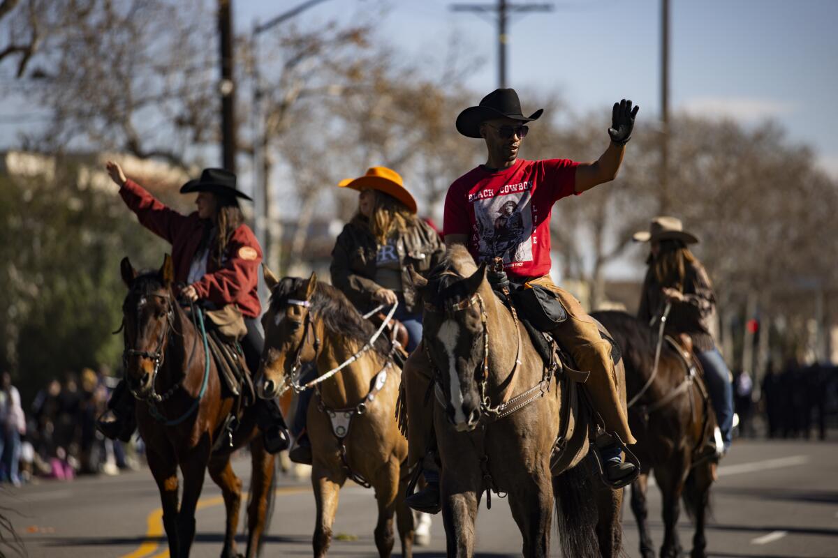 Participants ride horses during the Dr. Martin Luther King Jr. Day Parade.