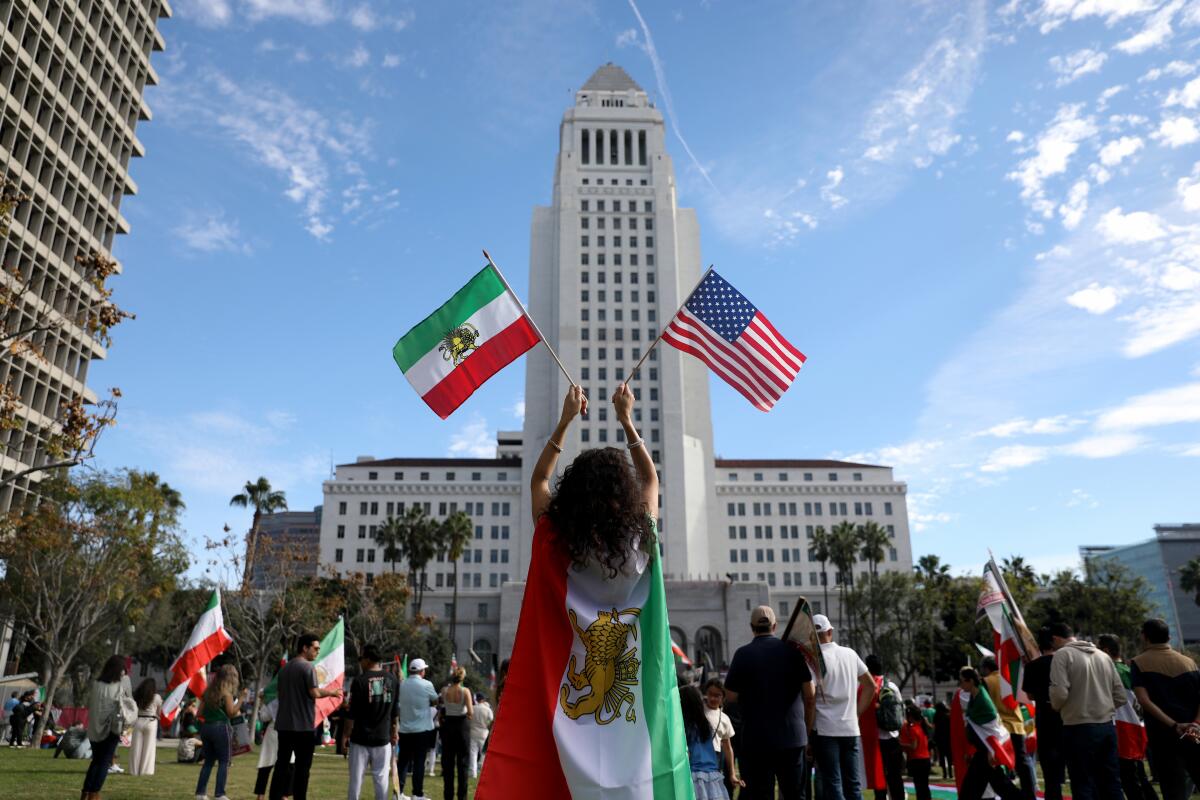 Iranians gather for a Make Iran Great Again march at City Hall in downtown L.A.