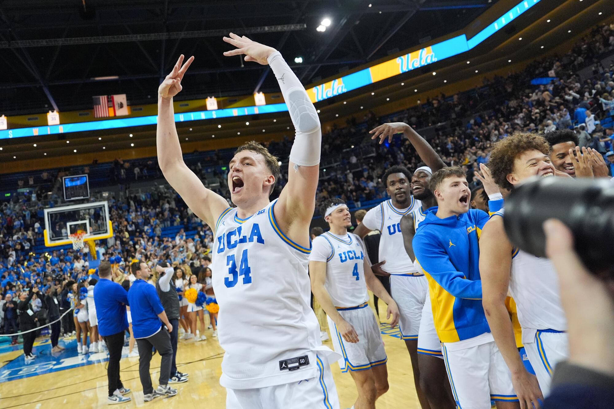 UCLA forward Tyler Bilodeau fires up the crowd after the Bruins defeated No. 4 Purdue on Tuesday at Pauley Pavilion.
