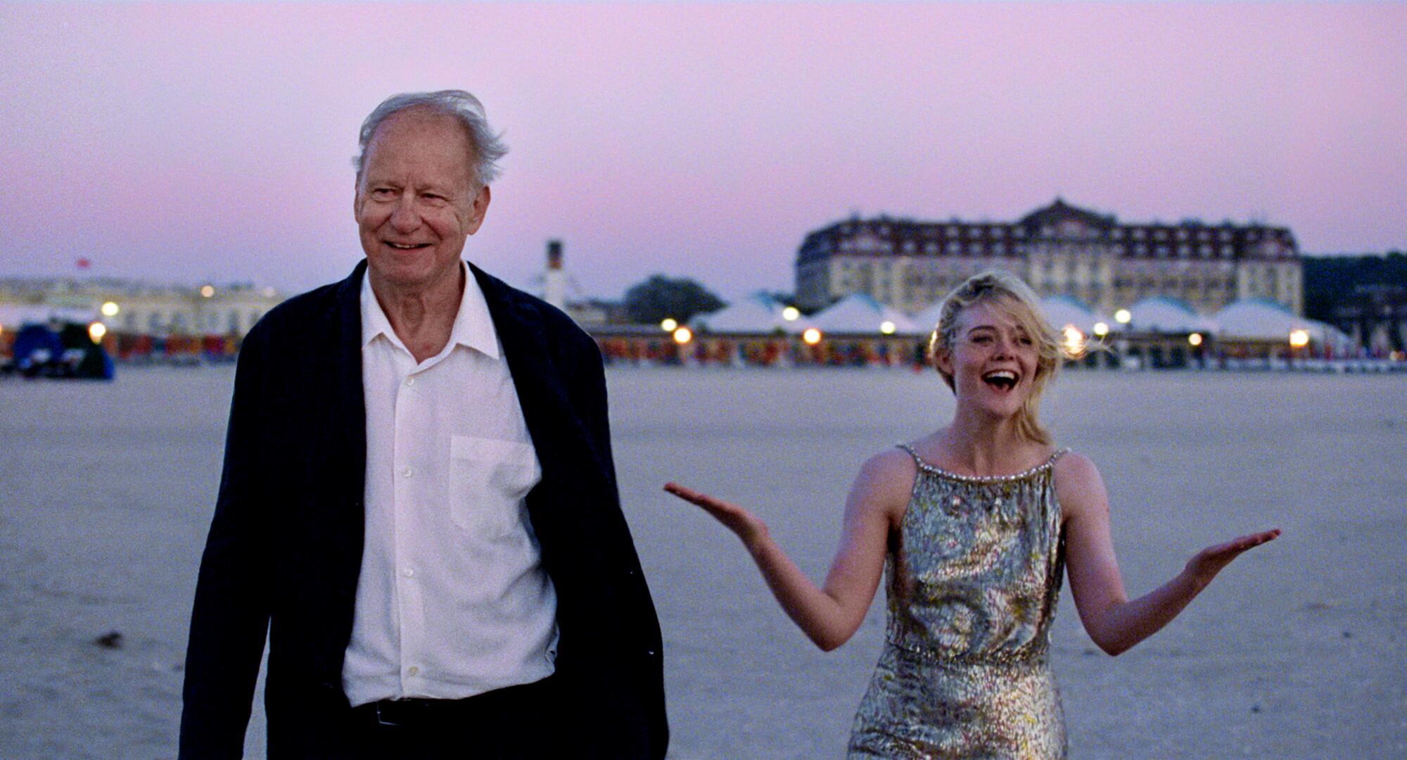 Stellan Skarsgård, left, and Elle Fanning in a scene from director Joachim Trier's "Sentimental Value."