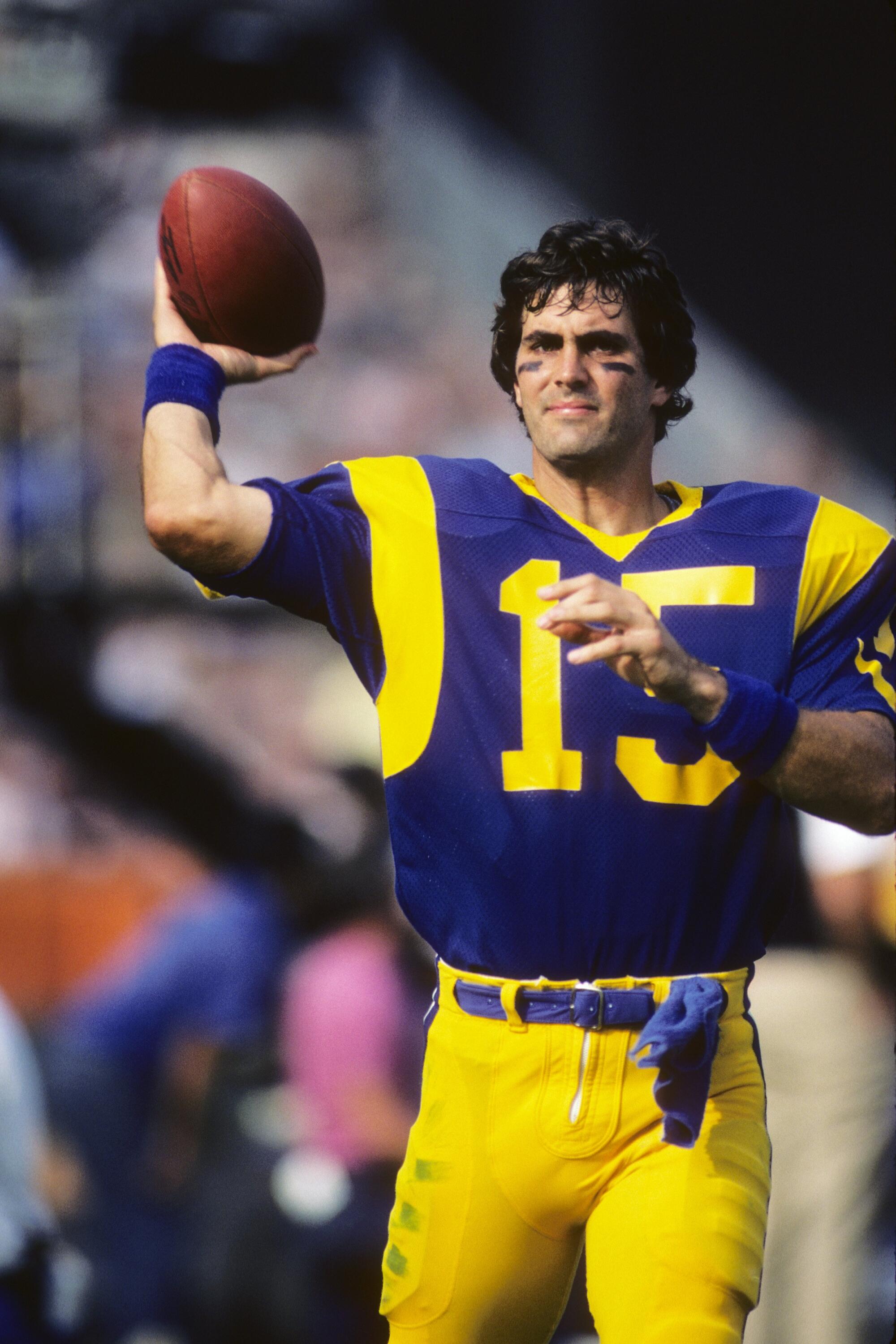 Rams quarterback Vince Ferragamo warms up before facing the Chicago Bears at Anaheim Stadium on Nov. 6, 1983.