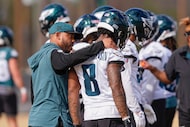 Philadelphia Eagles secondary coach Christian Parker talks with safety C.J. Gardner-Johnson...