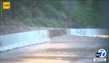 Water, mud rushes over barrier onto Altadena street