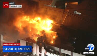 1 person hospitalized after large fire breaks out at commercial building in Winnetka, Los Angeles
