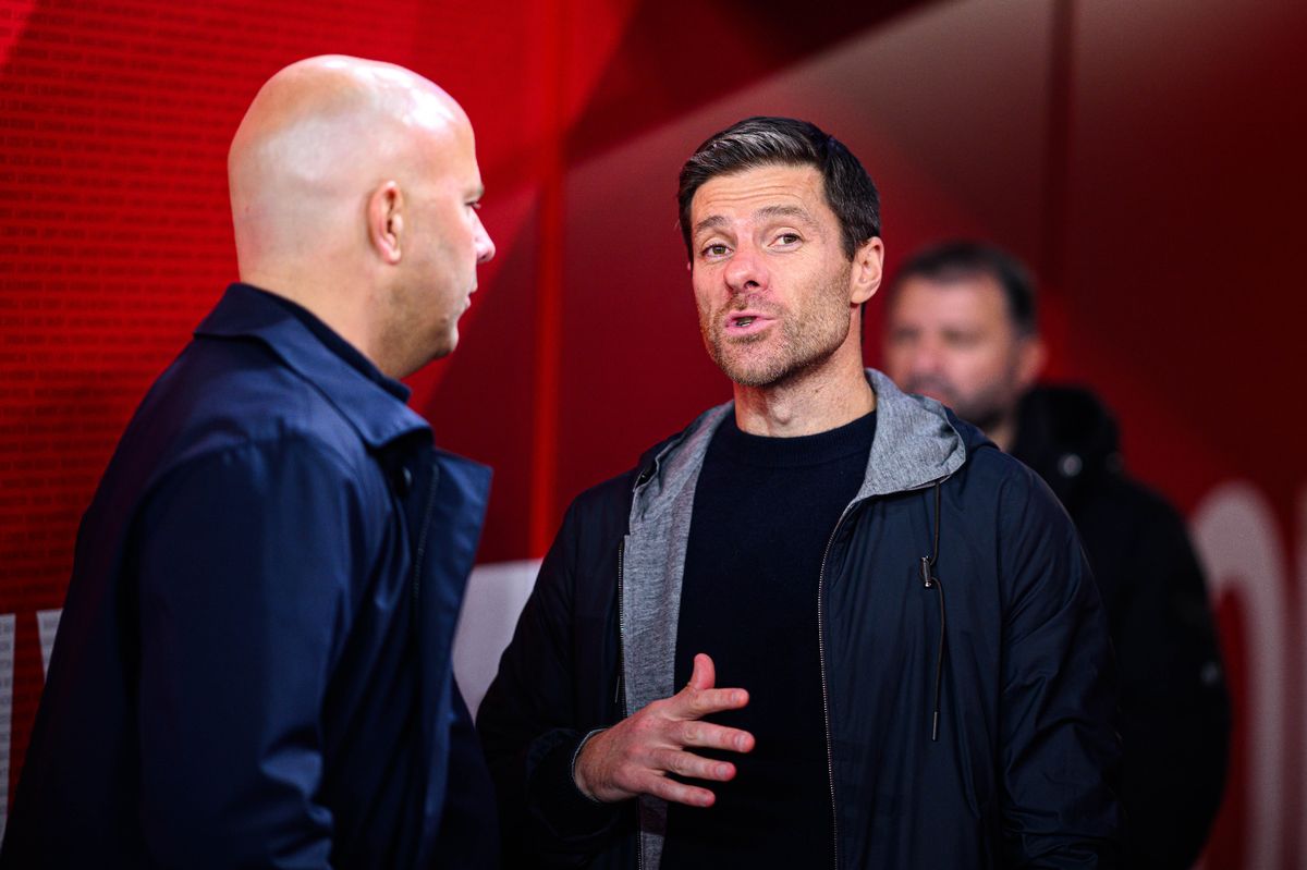 LIVERPOOL, ENGLAND - NOVEMBER 5: (L-R) Arne Slot of Liverpool and headcoach Xabi Alonso of Leverkusen  after the UEFA Champions League 2024/25 League Phase MD4 match between Liverpool FC and Bayer 04 Leverkusen at Anfield on November 5, 2024 in Liverpool, United Kingdom. (Photo by Jörg Schüler/Bayer 04 Leverkusen via Getty Images)