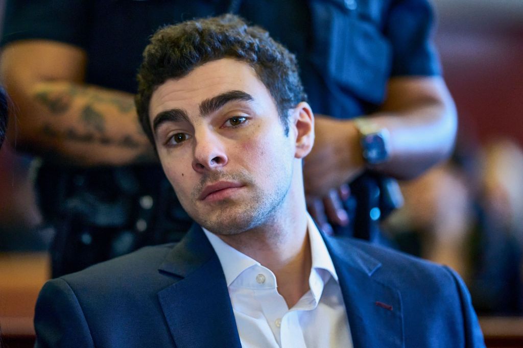 Luigi Mangione, facing second-degree murder charges, appears at a pretrial hearing in Manhattan Criminal Court.