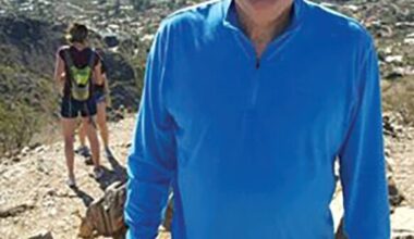 Frank Morris stands atop the Phoenix Mountain Preserve. Morris was about to hike Sept. 14 when he was assaulted by a cyclist in Paradise Valley. The Paradise Valley Police apprehended the cyclist about a week later. Now the case is closed.