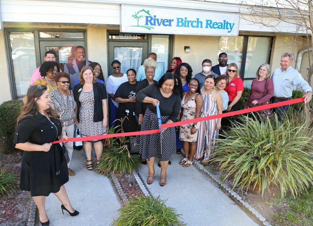 River Birch Realty owner Katrina Leek Robinson cut the ribbon on the firm