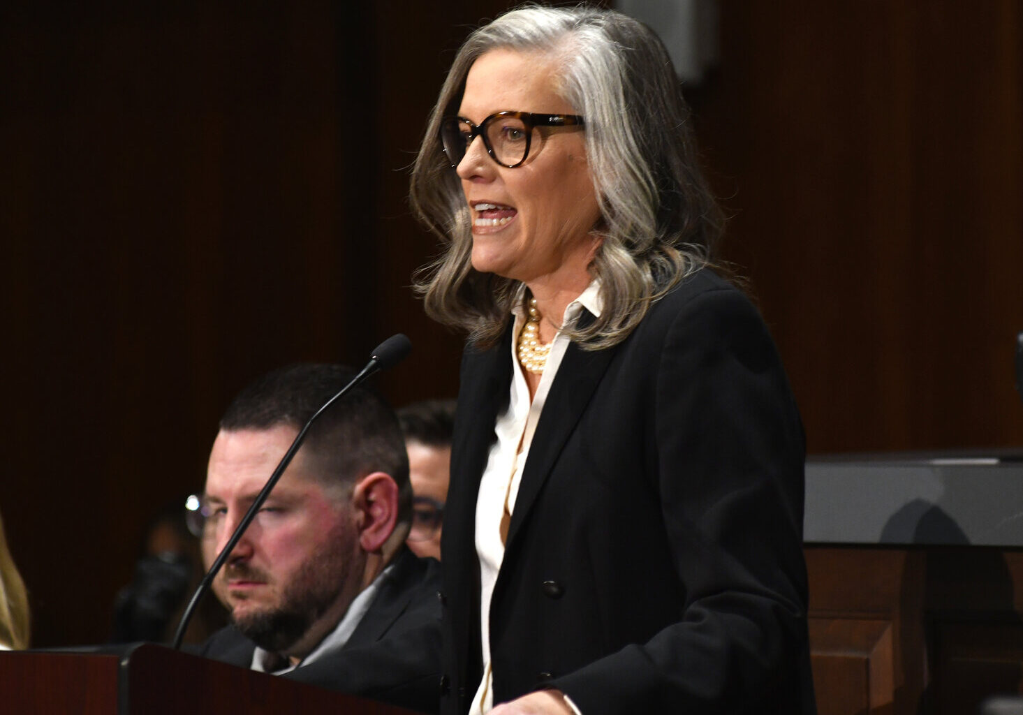 Gov. Katie Hobbs addresses lawmakers at the beginning of the 2025 legislative session.