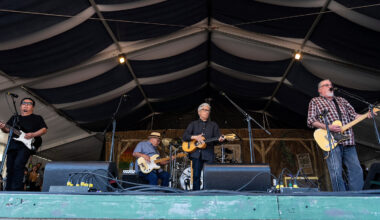 Cesar Rosas, left, Conrad Lozano, Louie Perez, and David Hidalgo of Los Lobos perform at the 2023 New Orleans Jazz & Heritage Festival on April 30, 2023, at the Fair Grounds Race Course in New Orleans.
