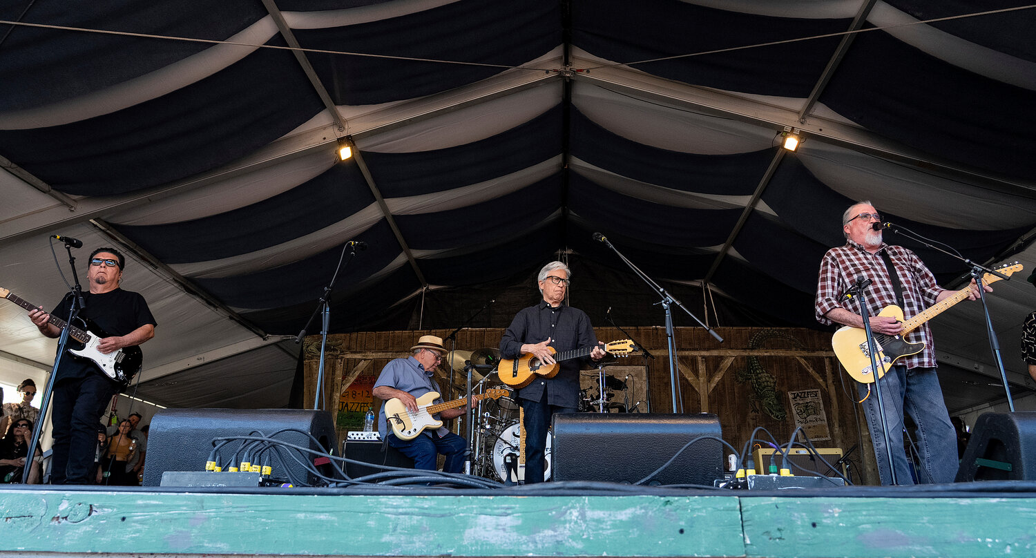 Cesar Rosas, left, Conrad Lozano, Louie Perez, and David Hidalgo of Los Lobos perform at the 2023 New Orleans Jazz & Heritage Festival on April 30, 2023, at the Fair Grounds Race Course in New Orleans.