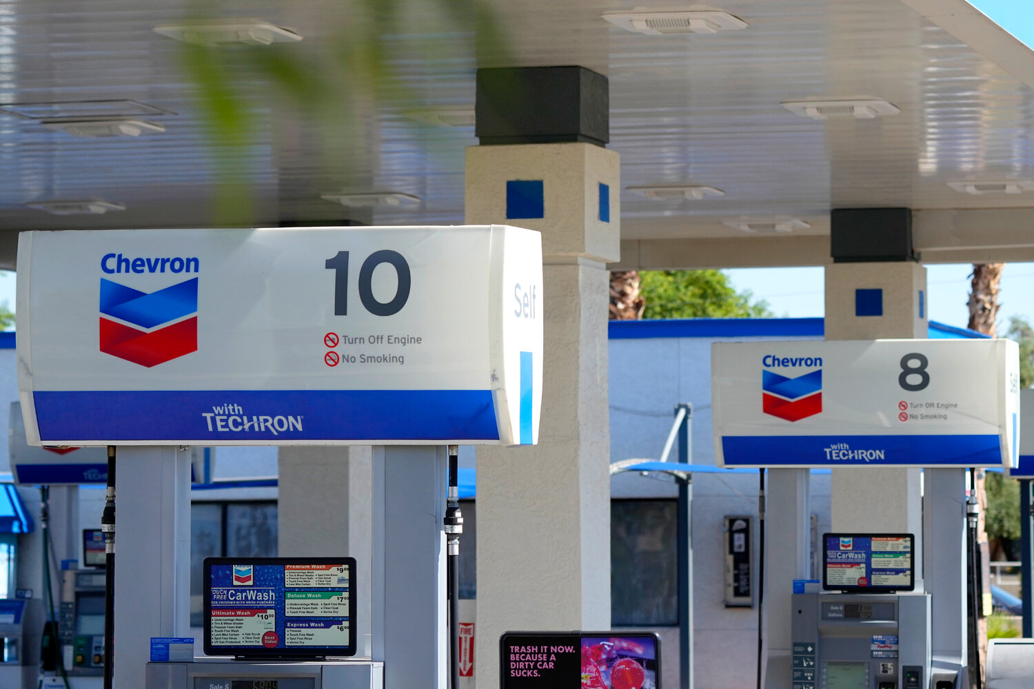 Chevron gas pump signage is shown at a local gas station Monday, Oct. 23, 2023, in Tempe. Gas prices fell 3 cents over the past week, averaging $2.95 a gallon.  (Associated Press/Ross D. Franklin)