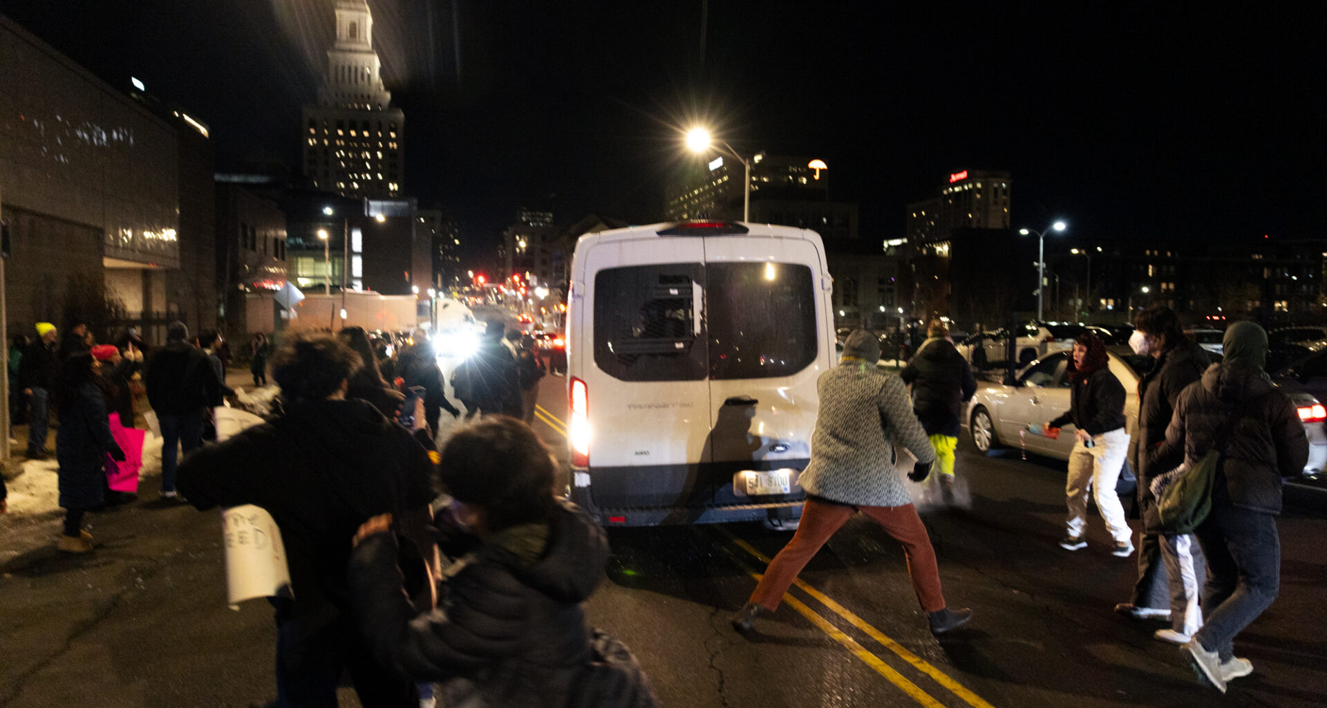 Federal vehicle knocks down protester during Renee Good vigil