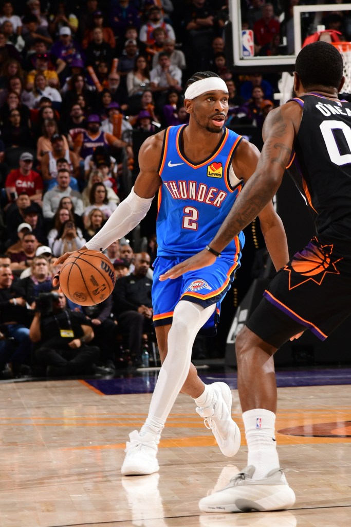 Shai Gilgeous-Alexander brings the ball up the court