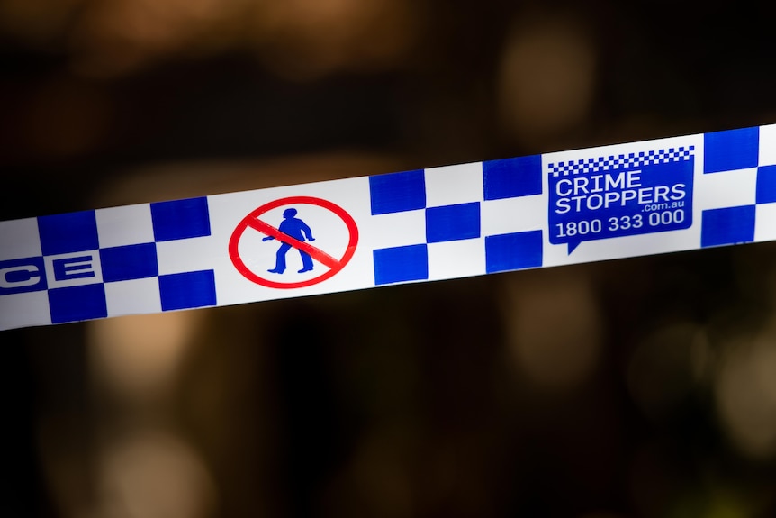 Crime scene tape outside a home.