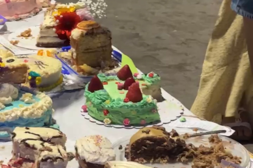A variety of cakes on a table