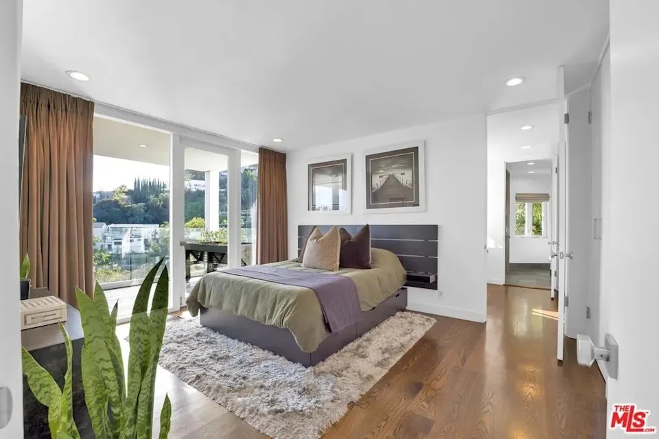 The bedrooms are spacious and bright, and could both be considered primaries.