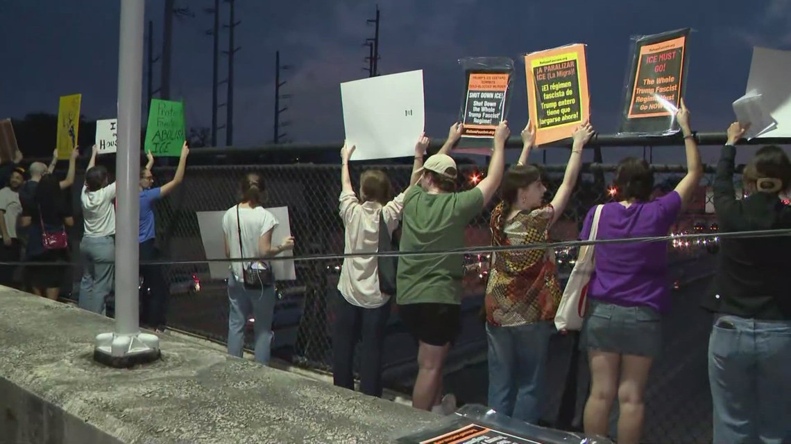 ICE protesters in Houston take to bridge over Southwest Freeway