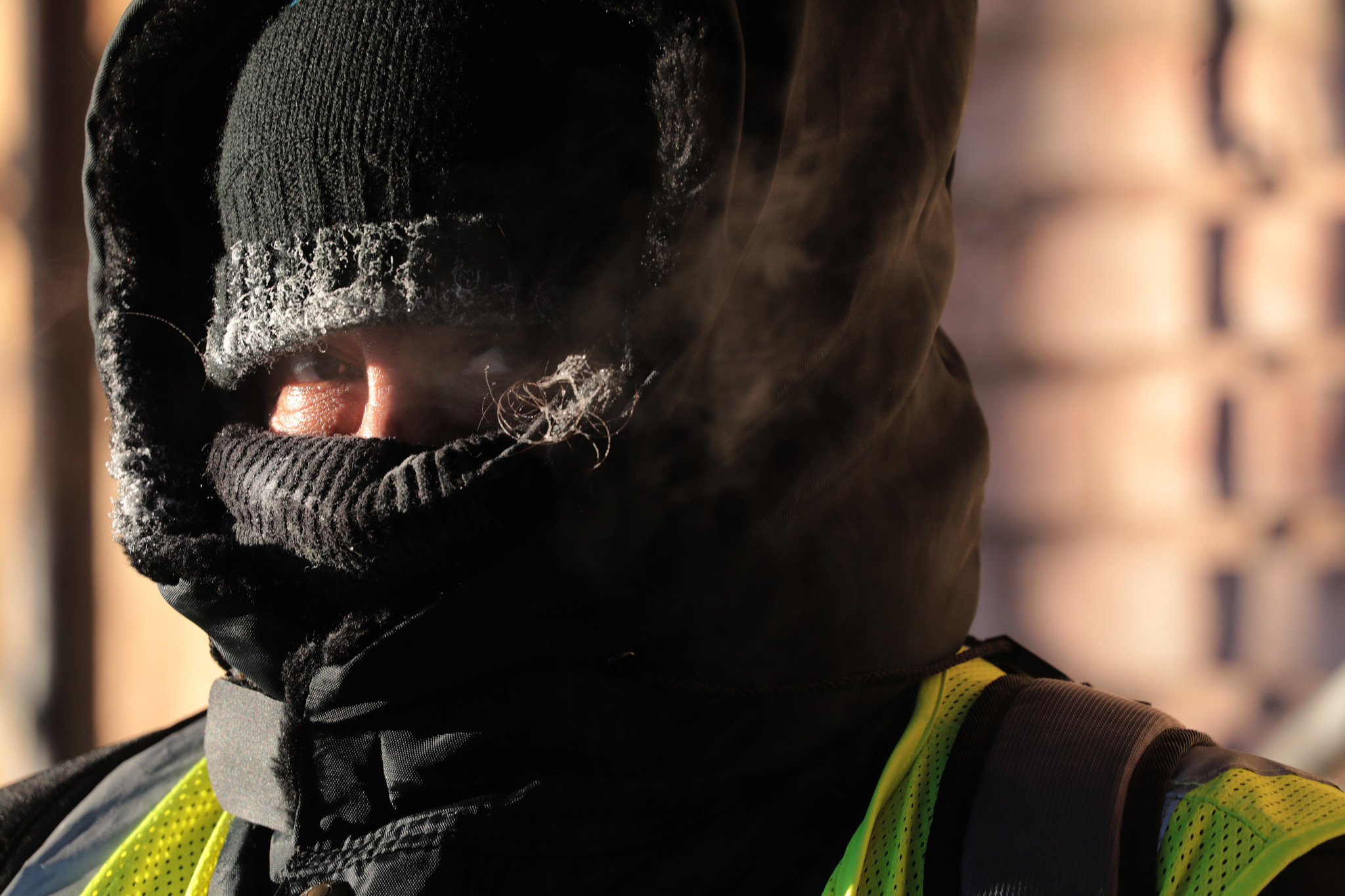 Safe passage worker Margarita Panora keeps watch for children as...