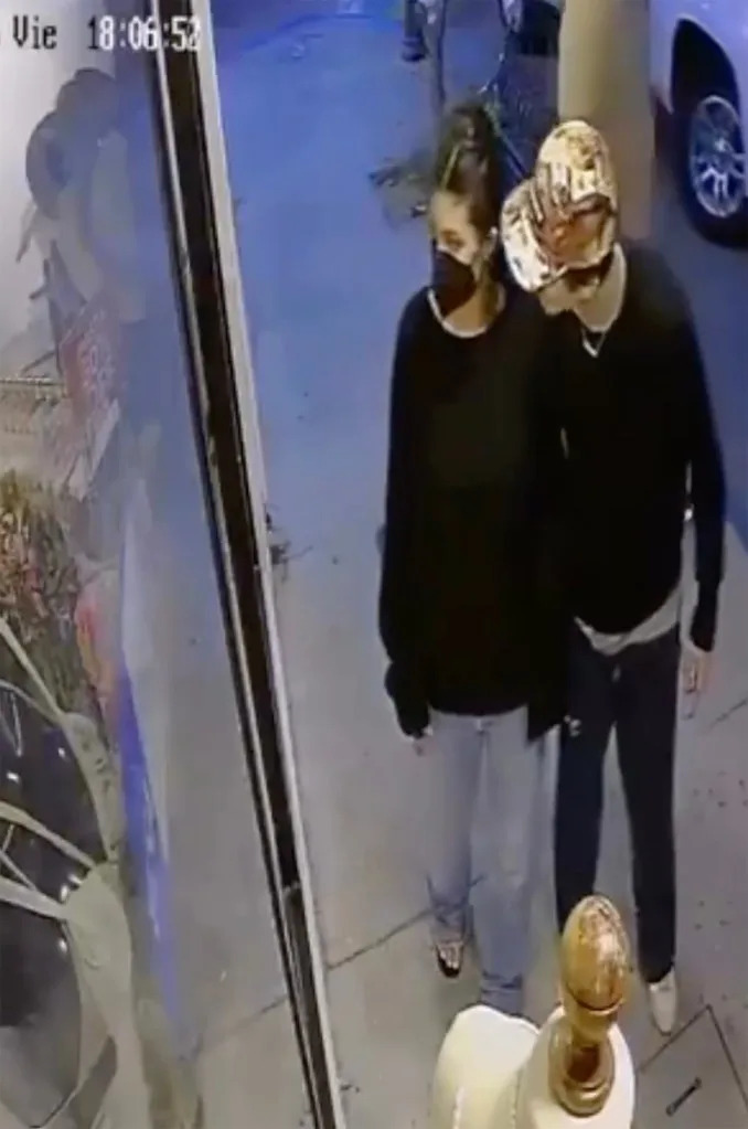 The couple were spotted at Hola Parce! Swimwear in CCTV footage on Thursday. holaparceswimwear/Instagram