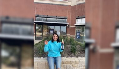 Owner Jessica Glenn stands in front of her new business location.