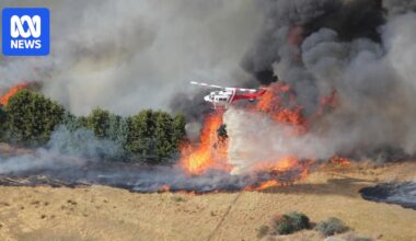 Victorian properties feared lost in out-of-control bushfire as heatwave persists