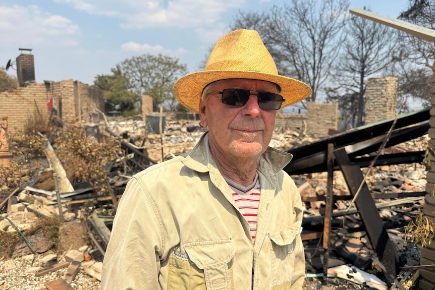 Don looks at the camera with a serious expression.