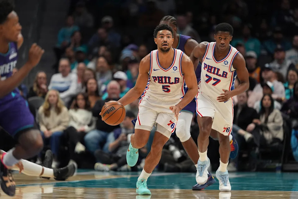 Jan 26, 2026; Charlotte, North Carolina, USA; Philadelphia 76ers guard Quentin Grimes (5) brings the ball up court against the Charlotte Hornets during the second quarter at Spectrum Center. Mandatory Credit: Jim Dedmon-Imagn Images