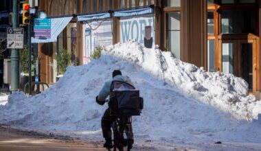 Mount Market Street at 7th Street, Center City Philadelphia, Tuesday, Jan. 27, 2026. Large pile of snow on northeast corner of Market and 7th.