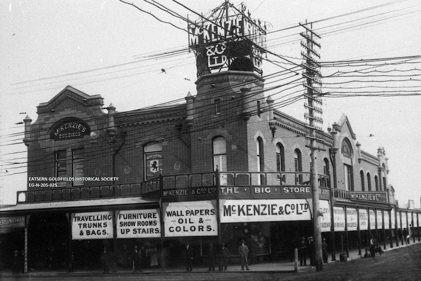 A black and white image shows the Mckenzie and Co store in Kalgoorlie, sometime in the early 20th century. 