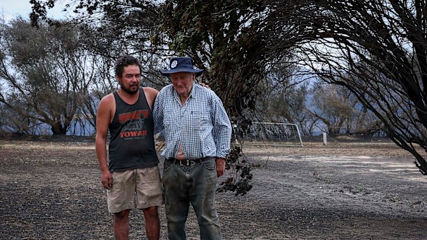 Along the Longwood-Ruffy Road, farm owners Mark Noye and his father Henry Noye deal with the aftermath.
