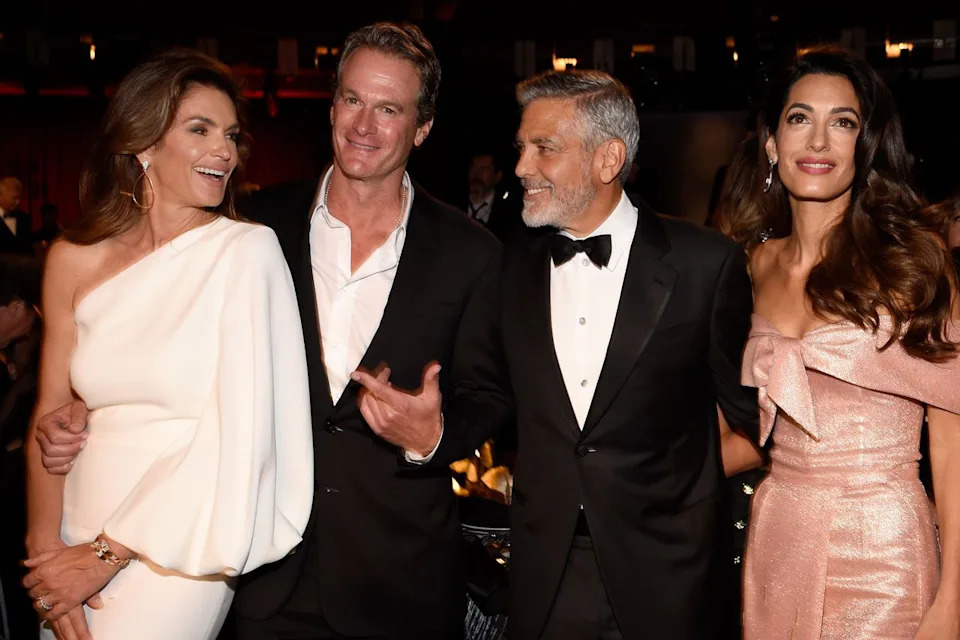 Kevin Mazur/Getty From left: Cindy Crawford, Rande Gerber, George Clooney and Amal Clooney in 2018
