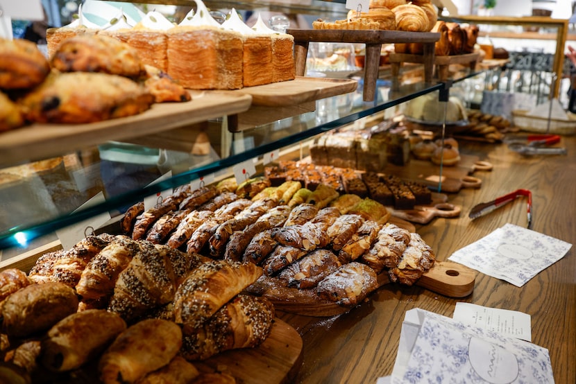 Pastries lay on the display counter at maman café’s grand opening Thursday, Nov. 20, 2025,...