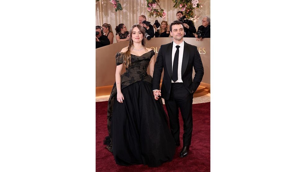 BEVERLY HILLS, CALIFORNIA - JANUARY 11: (FOR EDITORIAL USE ONLY) (L-R) Aimee Lou Wood and Adam Long attend the 83rd Annual Golden Globe Awards at The Beverly Hilton on January 11, 2026 in Beverly Hills, California. (Photo by Monica Schipper/Getty Images)