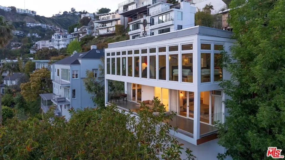 Prominent LA Art Dealer Ash Nouri has listed his carefully curated Hollywood Hills home for $2,425,000.